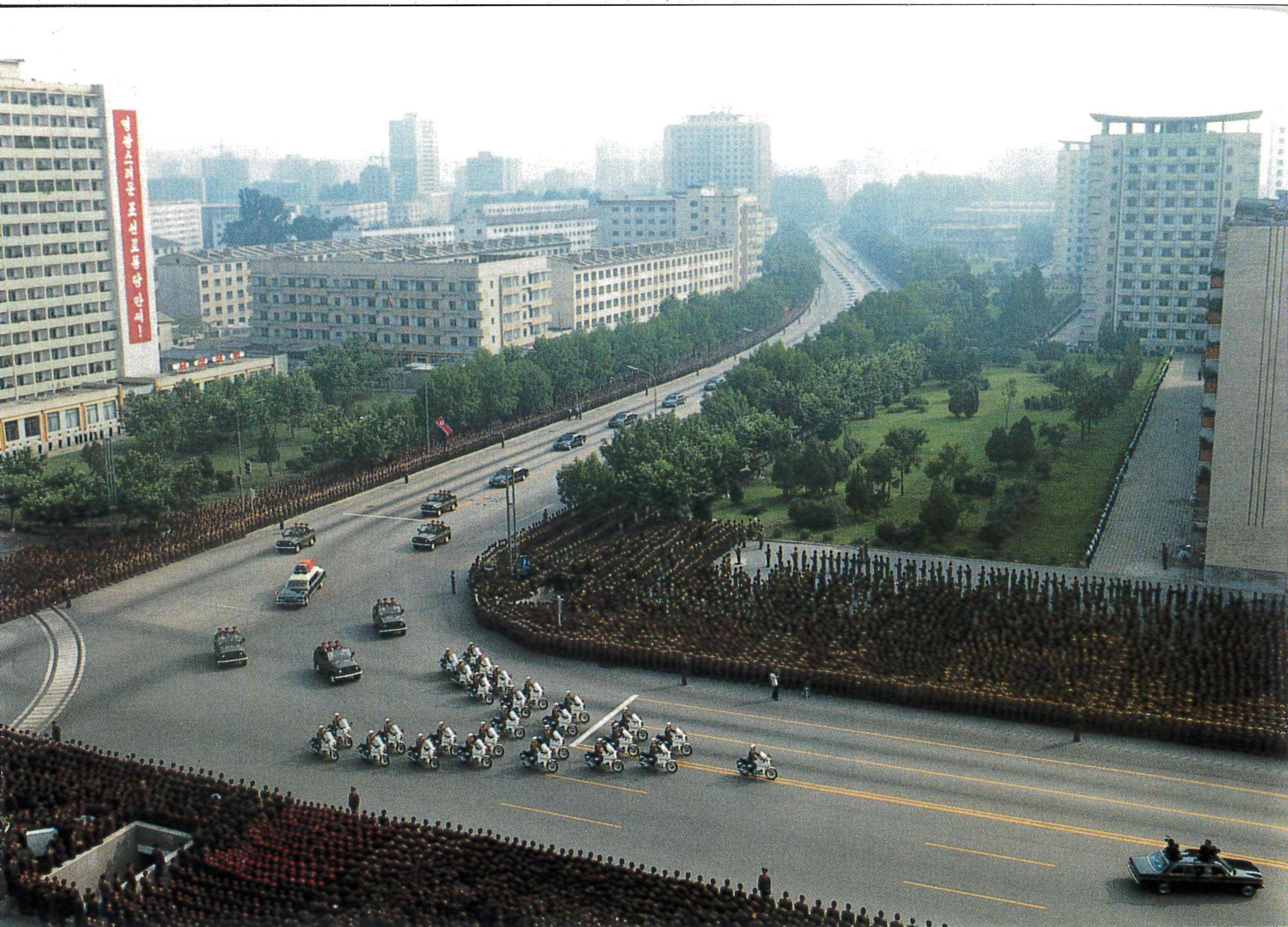 crowds of thousands in the North Korean capital Pyongyang watch the funeral motorcade of founder Kim…
