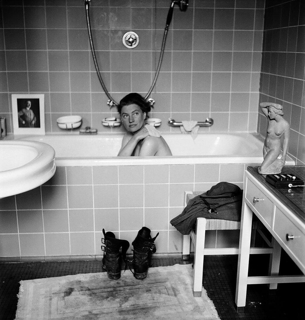 american photographer and model Elizabeth Miller in Hitler's bathtub, 1945