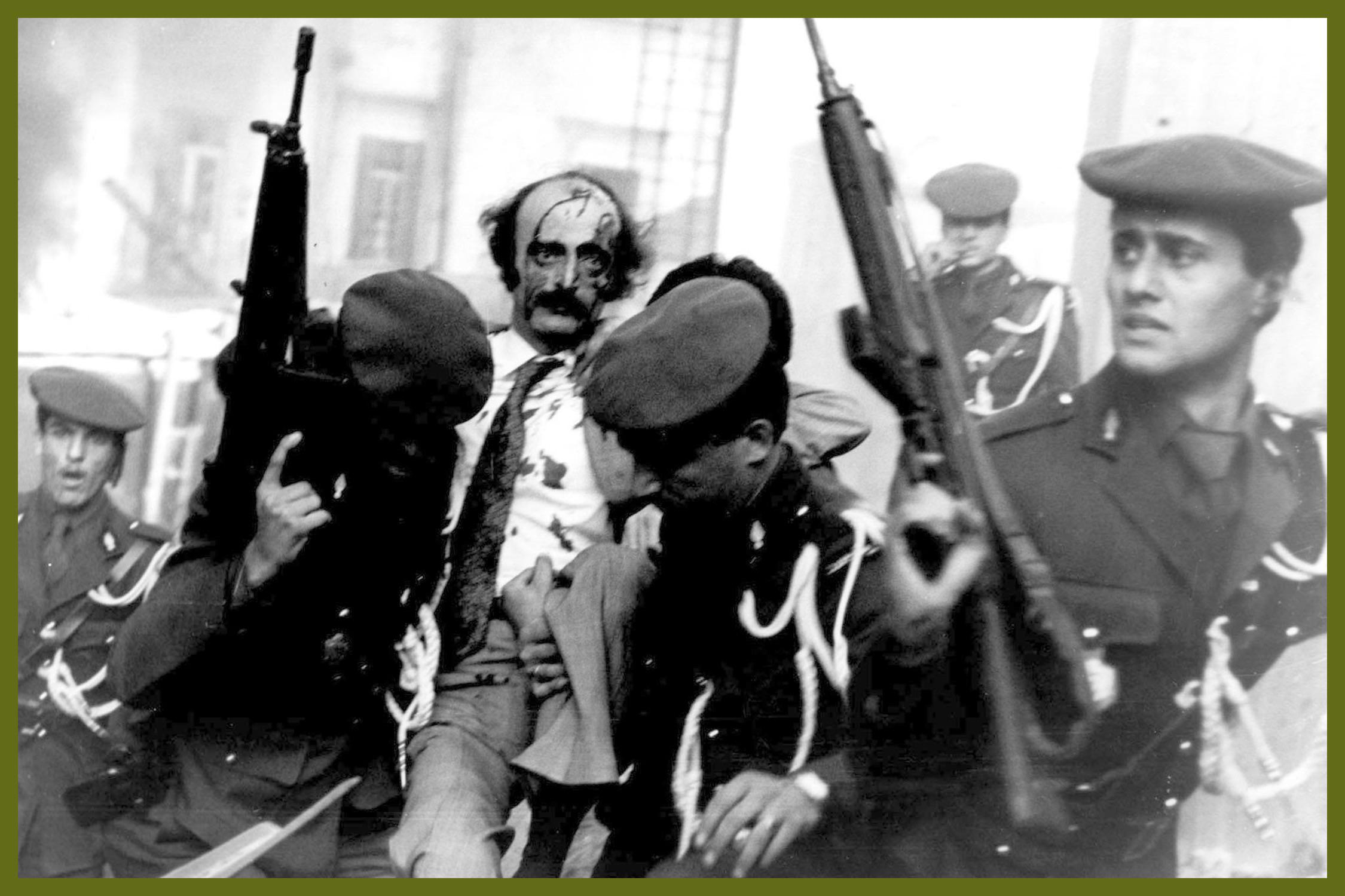 leader of the Progressive Socialist Party, Walid Jumblatt, being carried away after a car bomb explo…