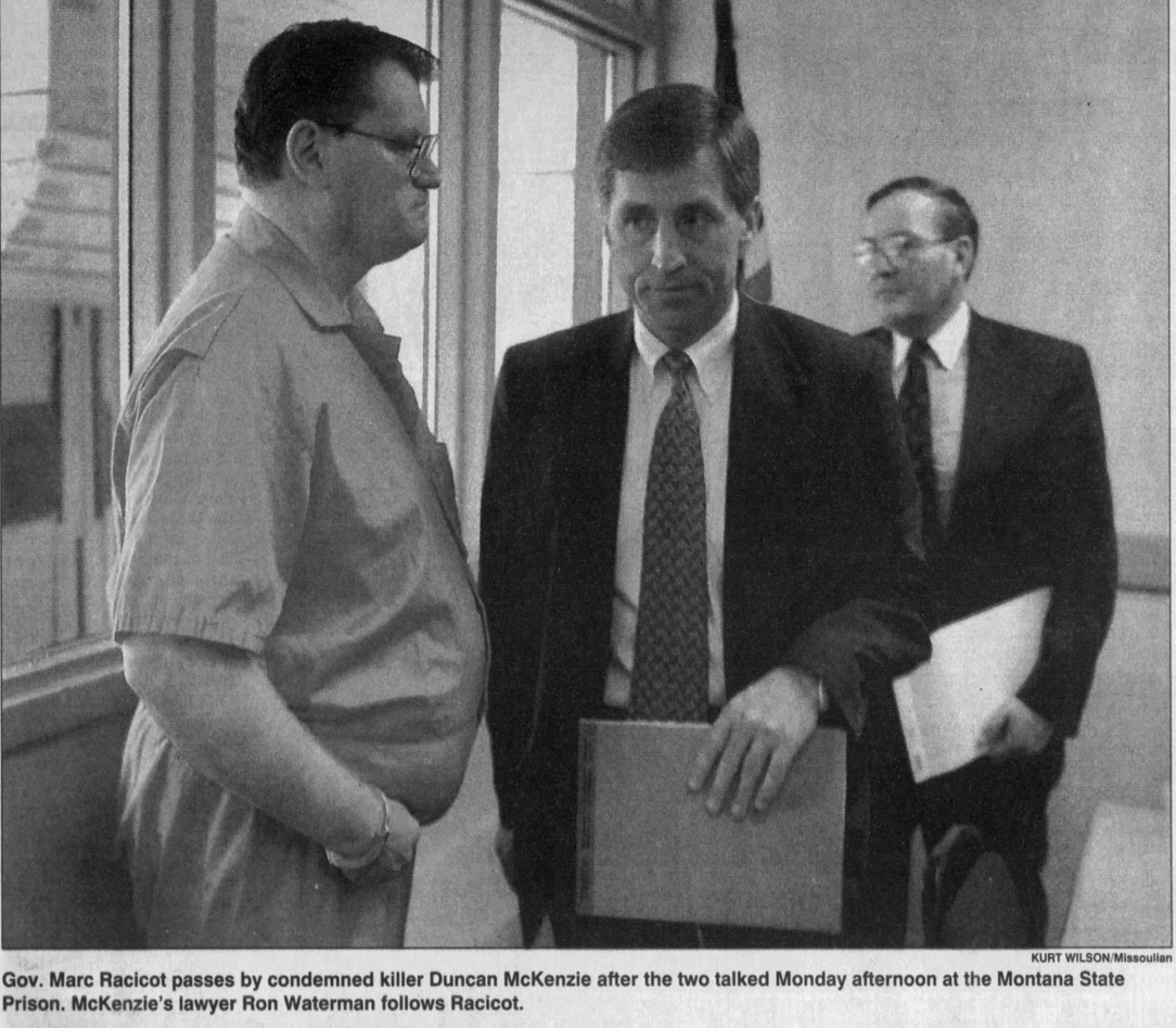 montana Governor Marc Racicot passes by death row inmate Duncan McKenzie. At a face-to-face meeting,…