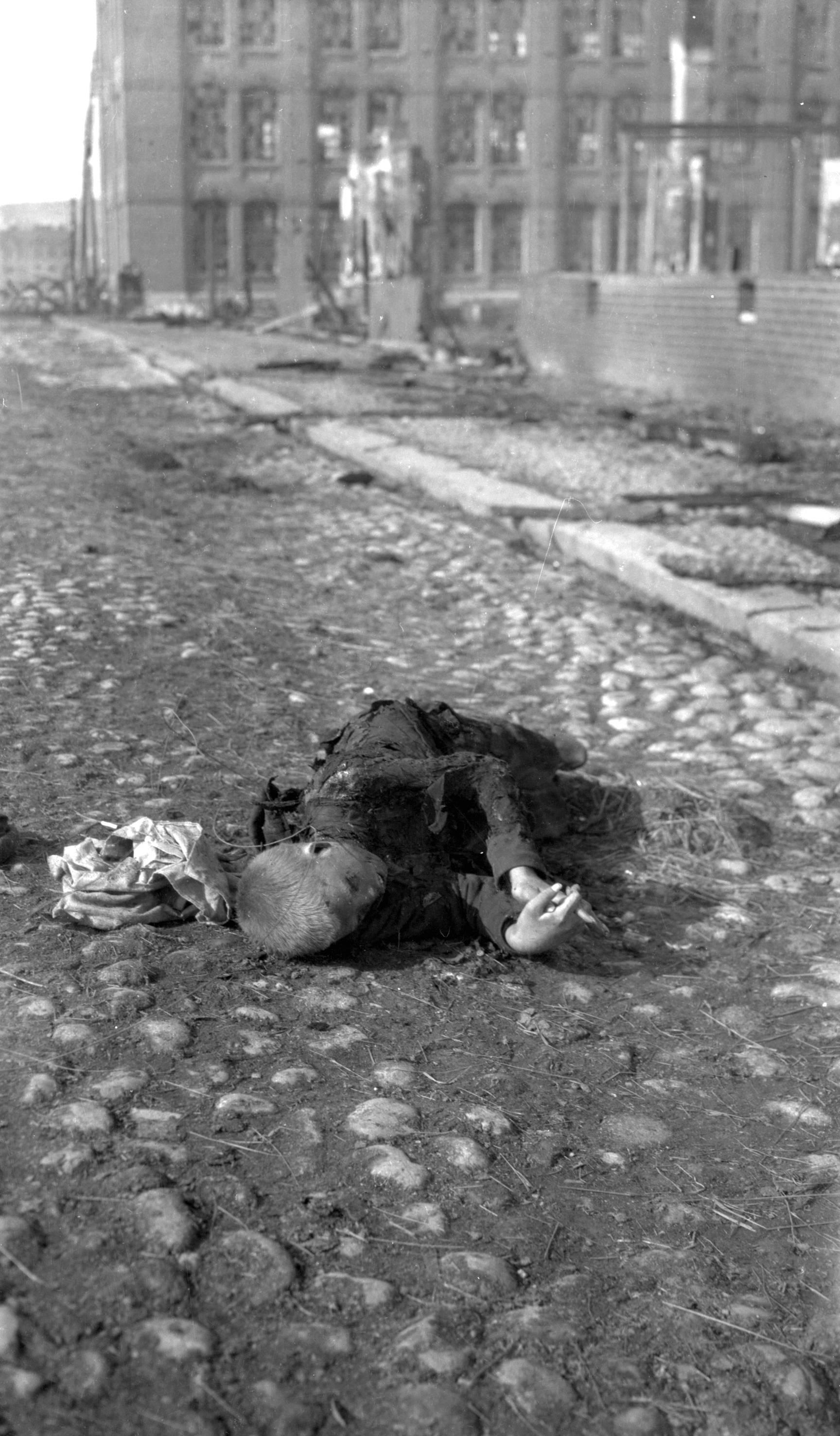 the corpse of a little boy laying in the street following the battle of Tampere, the bloodiest engag…