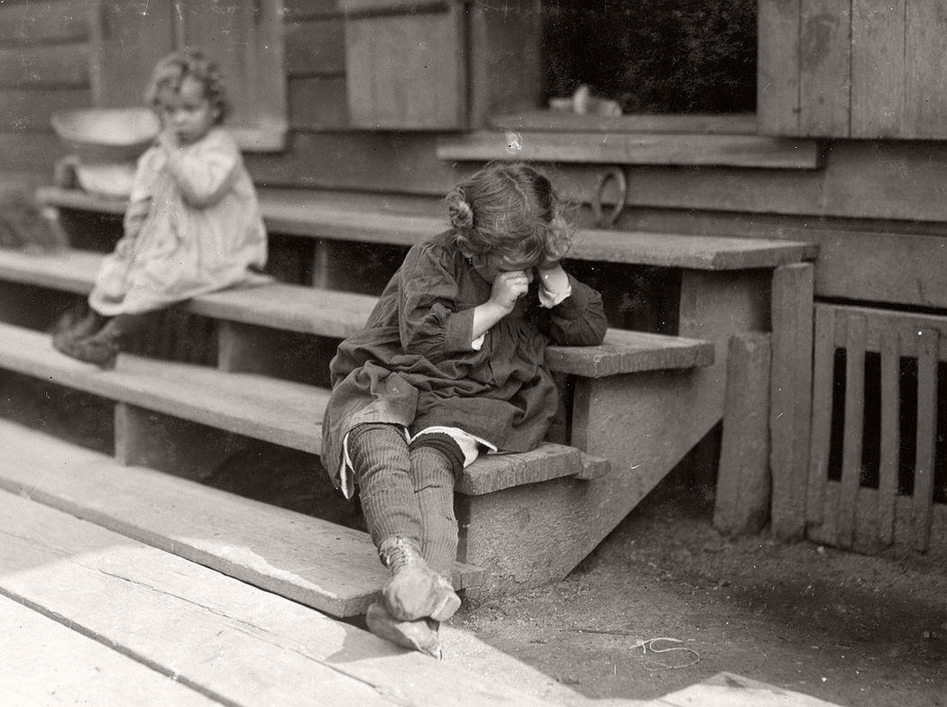 5-year-old after day’s work, was tired and refused to be photographed, Biloxi, Mississippi, 1911. Ph…