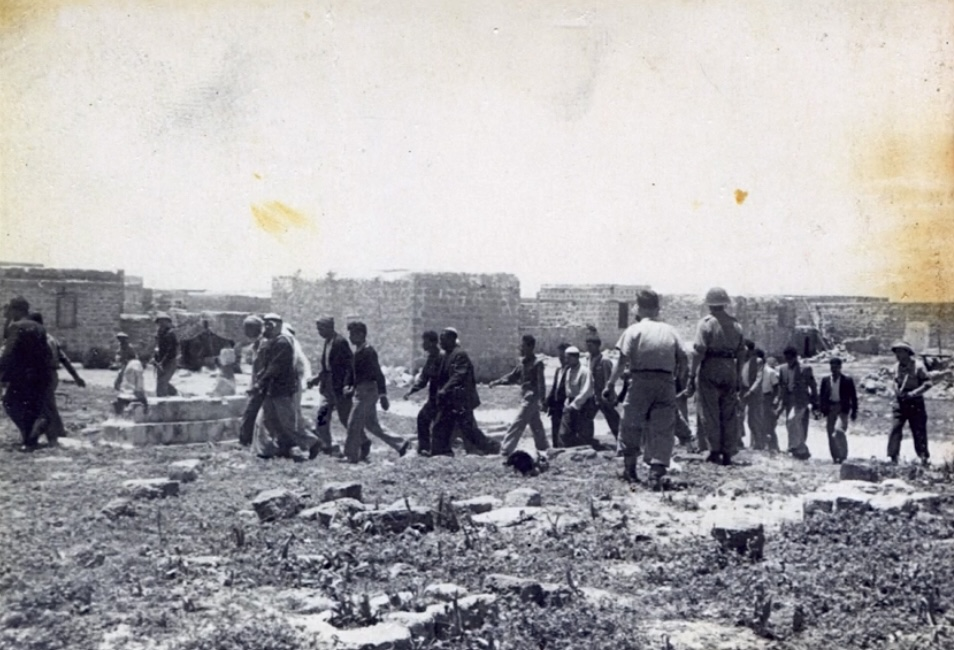 israeli Haganah soldiers with detained Palestinians on 23 May 1948, after the village of Tantura sur…