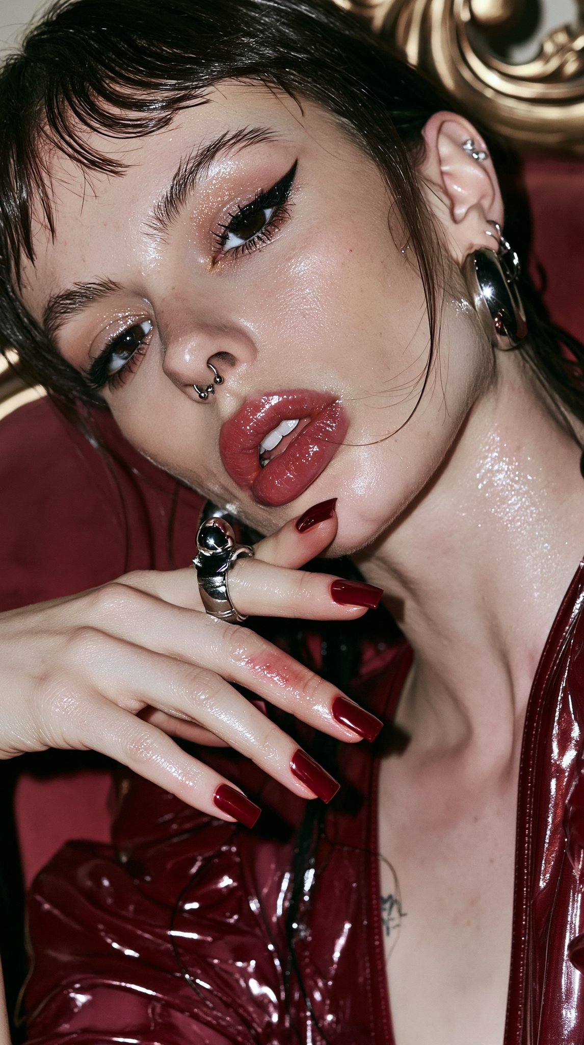 Red lacquer, sharp wings, chrome rings, and a camera flash that clearly walked into the room uninvit…