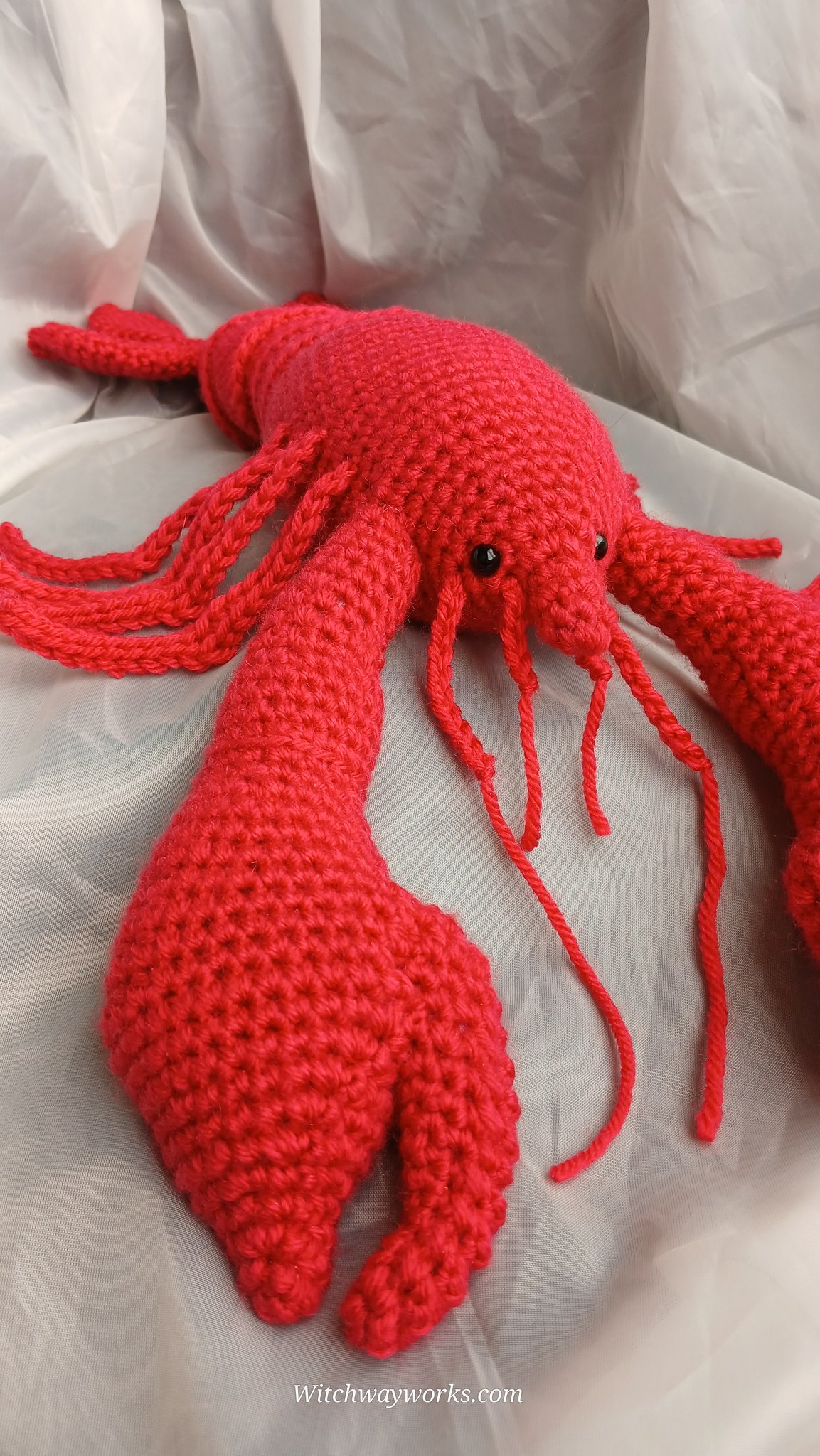 Meet Rock the Lobster 🦞❤️ — my giant, snuggly, bright-red crustacean companion, freshly conjured fro…